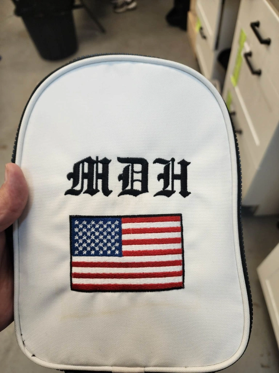 Artwork in digitized and stitch form